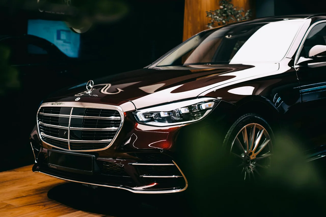 Black Mercedes-Benz S-Class in soft showroom light